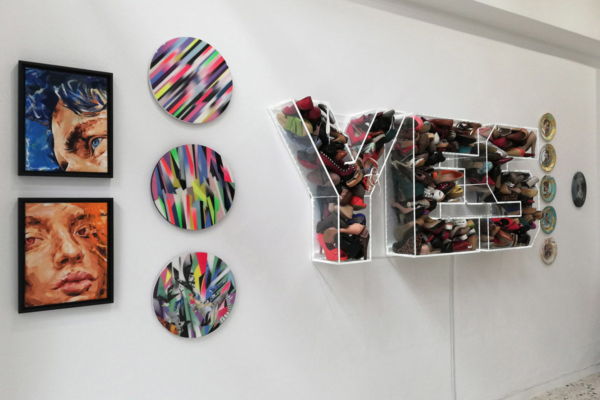 Artworks than enhance that sofa's fabric exhibition view