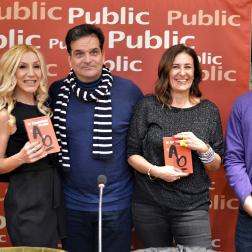 Alexandra Kollaros posing at her book launch in Public Bookstores