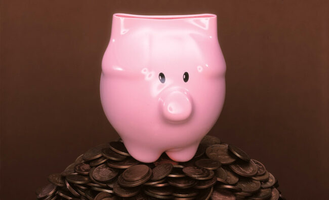 pink dip moulded piggy bank by inflate