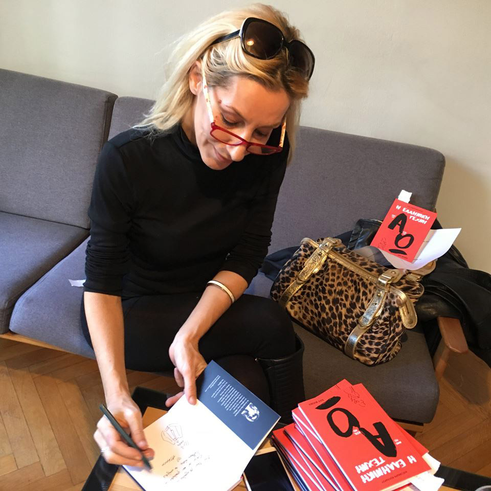 Alexandra Kollaros signing her book